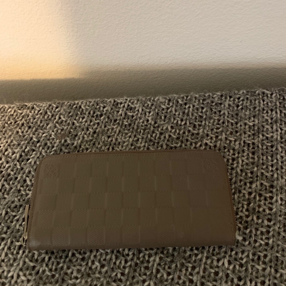 Louis Vuitton grayish brown wallet